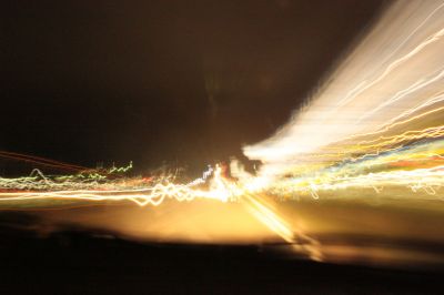 Set your camera to a 30 sec shutter, set it on your dash, drive around town... you'll get something like this
